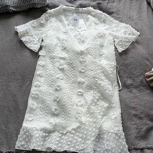 Fit and flare wrap dress white with floral appliqués NWT